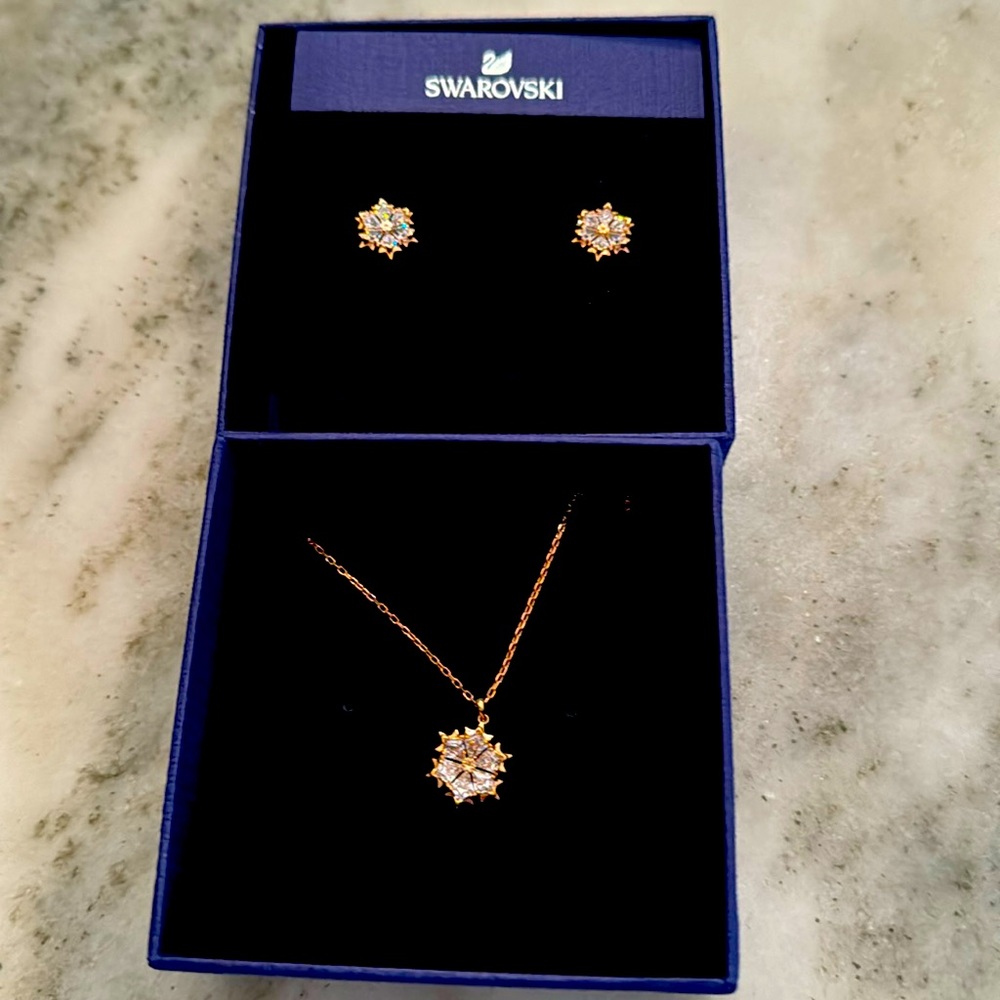 Swarovski rose gold snowflake earrings and necklace